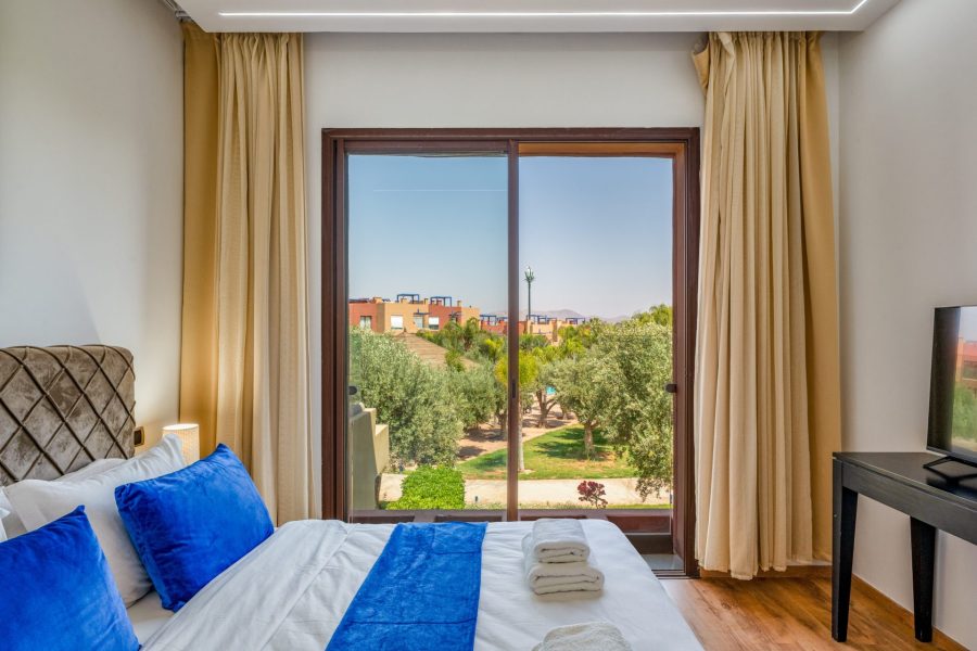 Appartement Lumineux avec vue piscine palmeraie